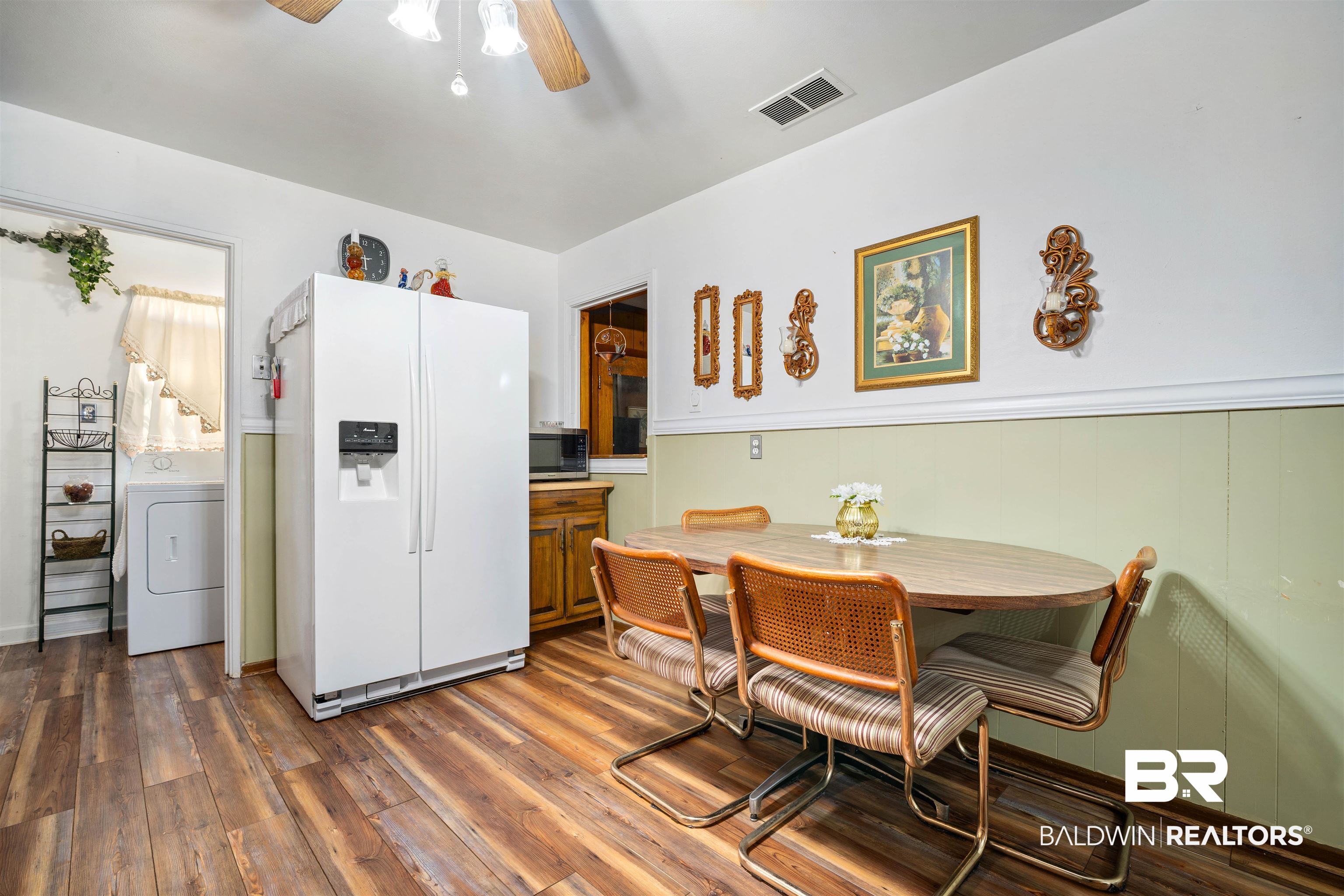 2618 Serigny Drive Mobile, AL 36605 - Photo 11 of 25 Dining room featuring washer / clothes dryer, dark wood-style floors, and ceiling fan
