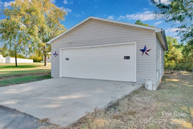 a view of an outdoor space with swimming pool