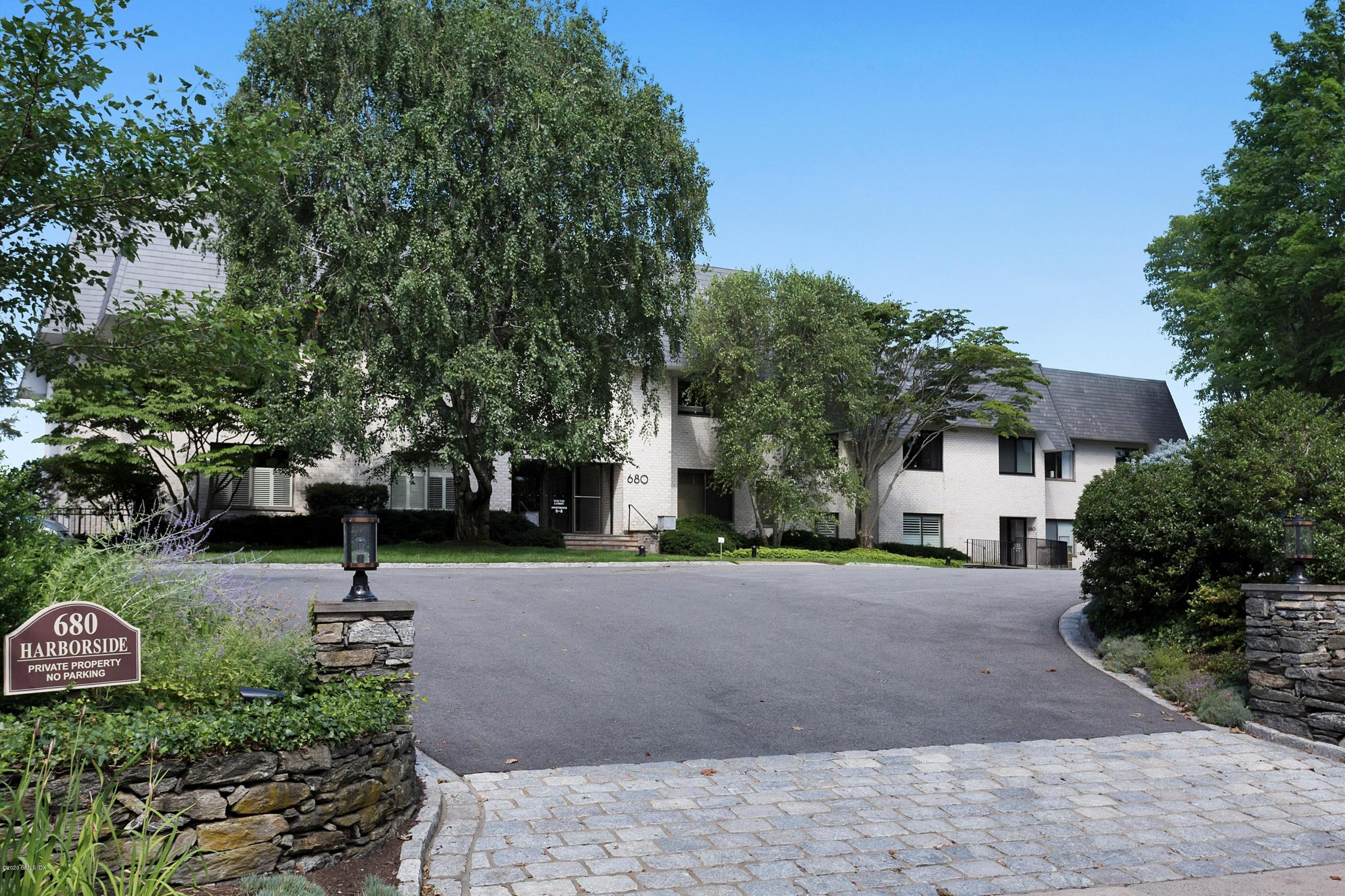 680 Steamboat Road, Unit 5 Greenwich, CT 06830 - Photo 21 of 21 a view of a street with houses on both side