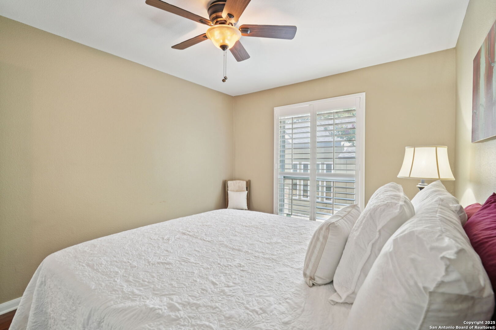 100 Lorenz Road, Unit 1204 San Antonio, TX 78209 - Photo 15 of 27 a bedroom with a bed and a window