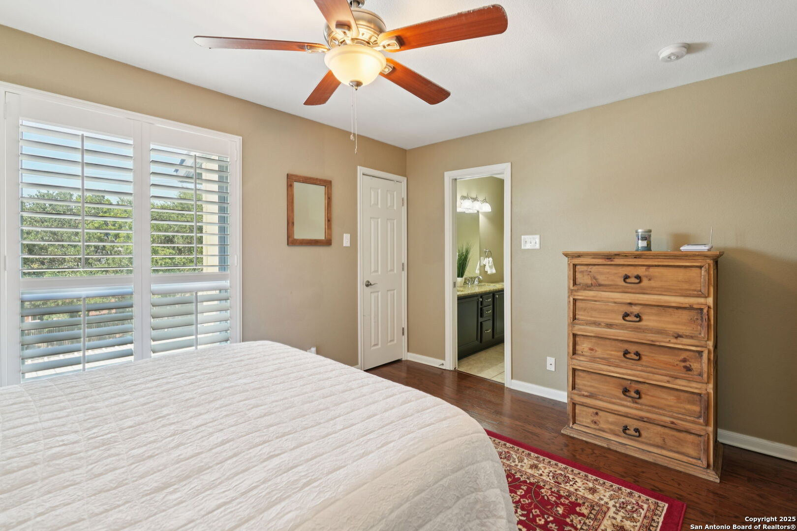 100 Lorenz Road, Unit 1204 San Antonio, TX 78209 - Photo 20 of 27 a bedroom with a bed and a dresser
