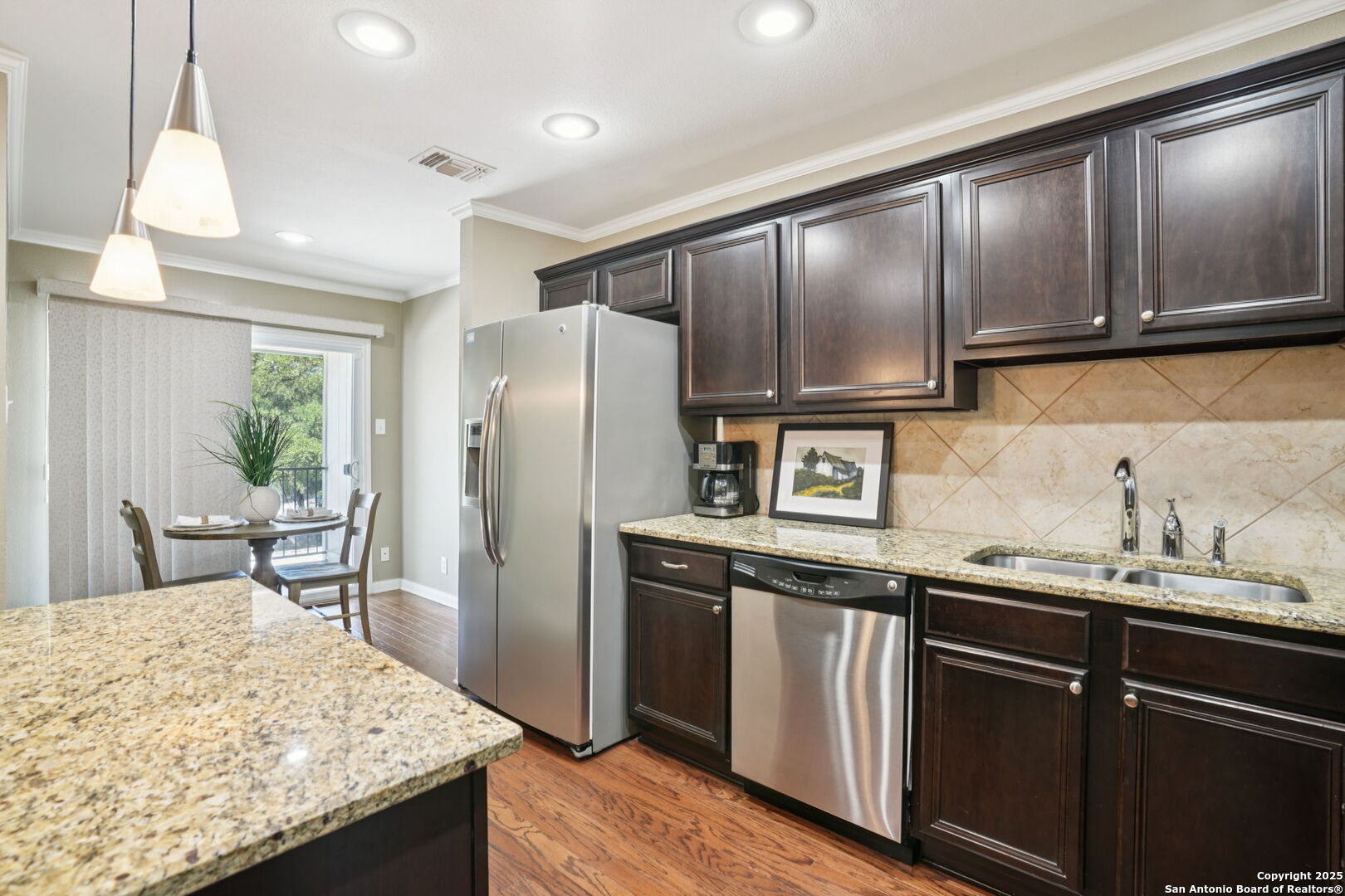 100 Lorenz Road, Unit 1204 San Antonio, TX 78209 - Photo 10 of 27 a kitchen with stainless steel appliances granite countertop a sink stove and refrigerator