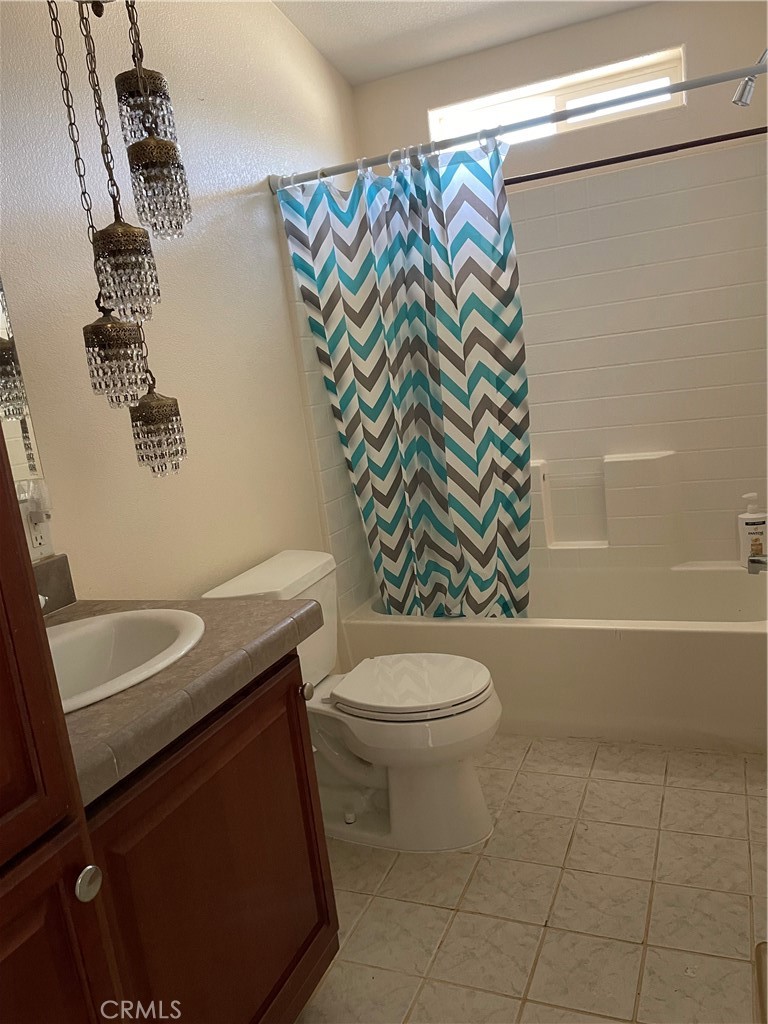 58735 Meyers Lane Anza, CA 92539 - Photo 14 of 18 a bathroom with a granite countertop toilet and a sink