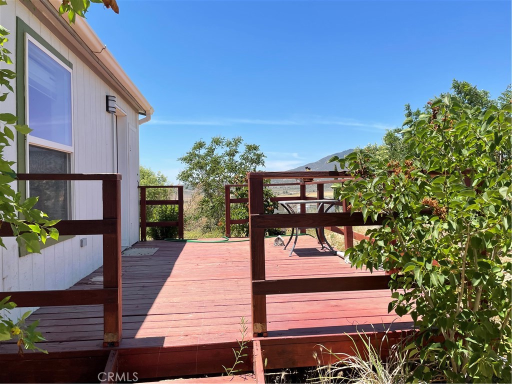 58735 Meyers Lane Anza, CA 92539 - Photo 4 of 18 a view of a patio with chairs and potted plants