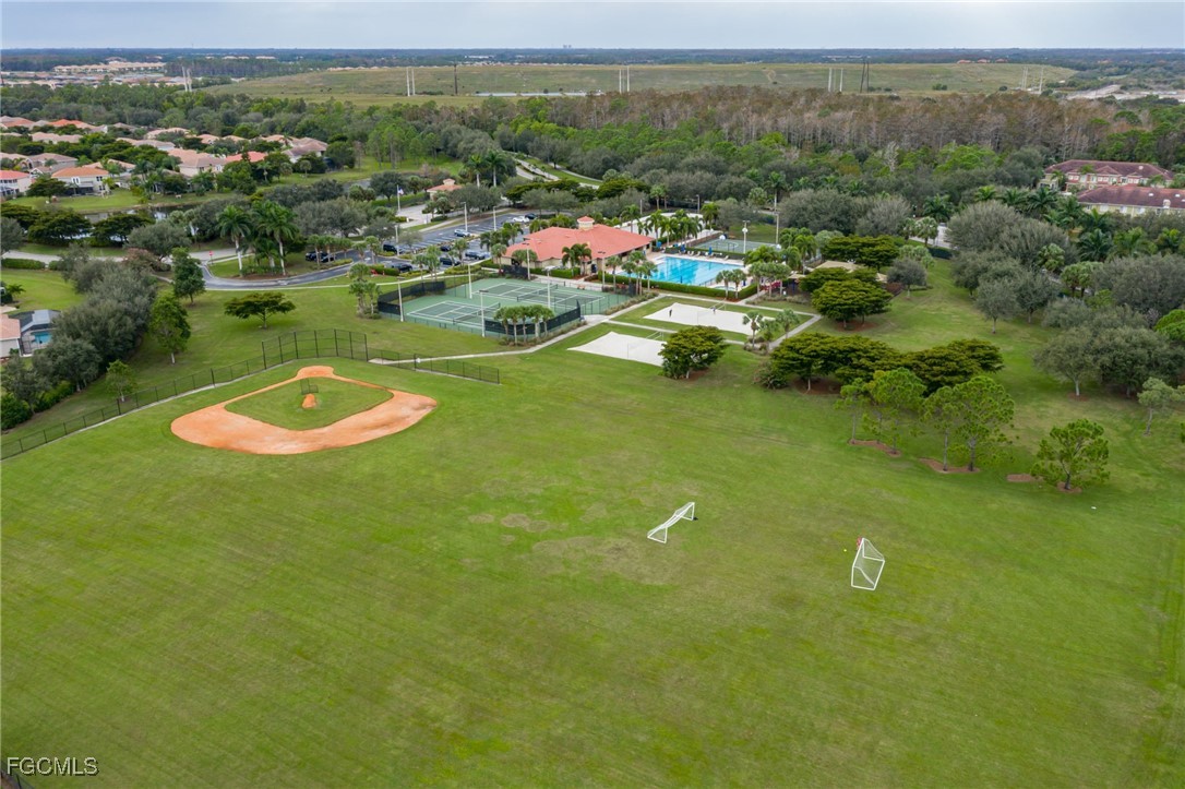 12406 Rock Ridge Lane Fort Myers, FL 33913 - Photo 31 of 35 a view of a city with mountains in the background