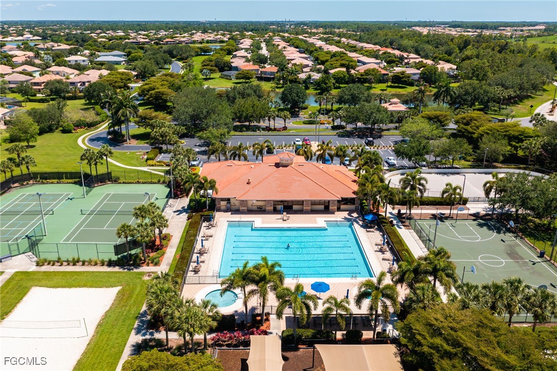 12406 Rock Ridge Lane Fort Myers, FL 33913 - Photo 33 of 35 an aerial view of residential houses with outdoor space