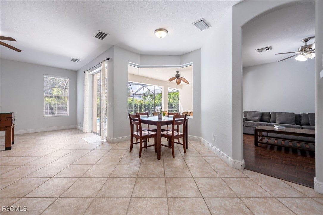 12406 Rock Ridge Lane Fort Myers, FL 33913 - Photo 7 of 35 a dining room well furnished