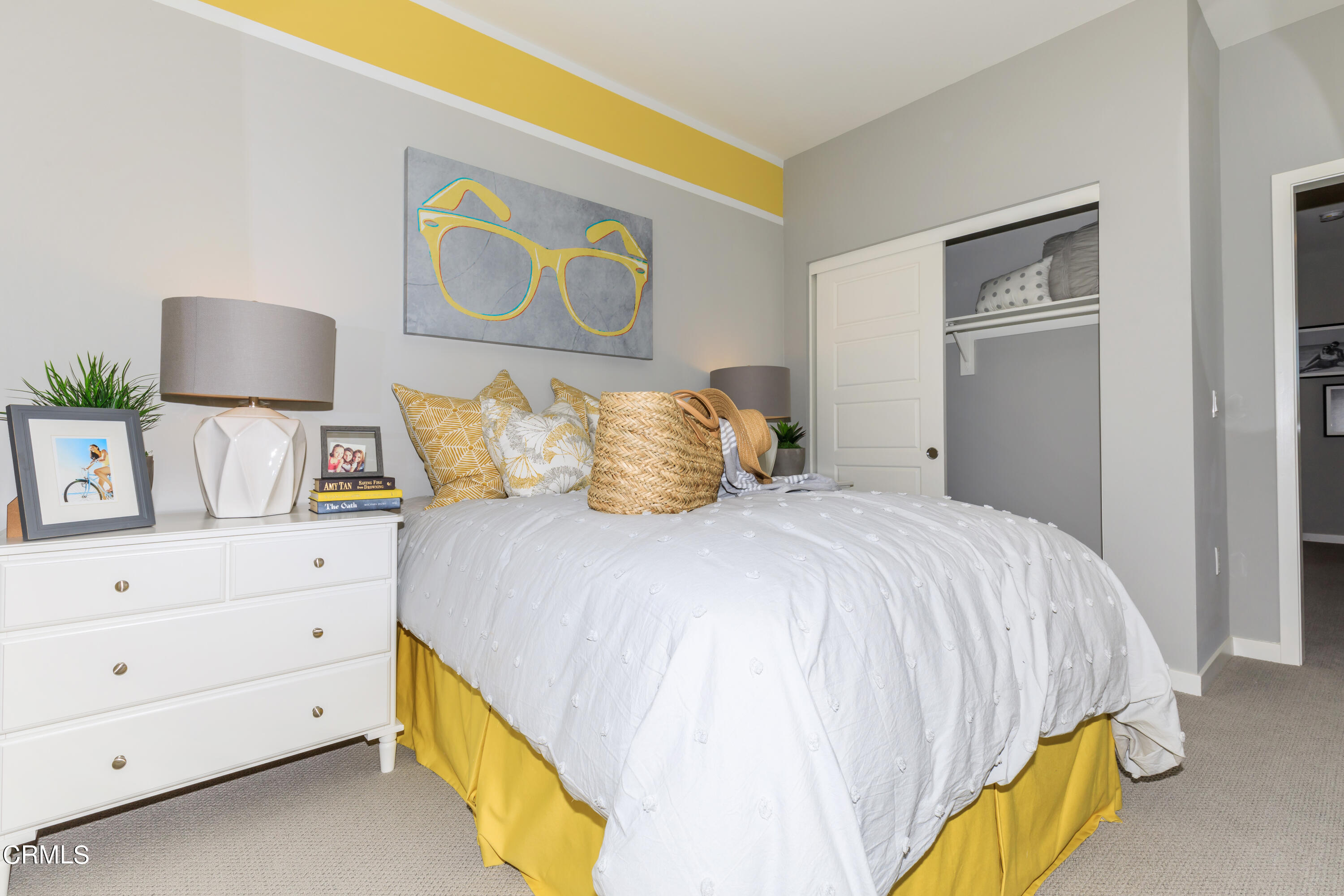 703 Winchester Drive Oxnard, CA 93036 - Photo 20 of 30 a bedroom with a bed and lamp