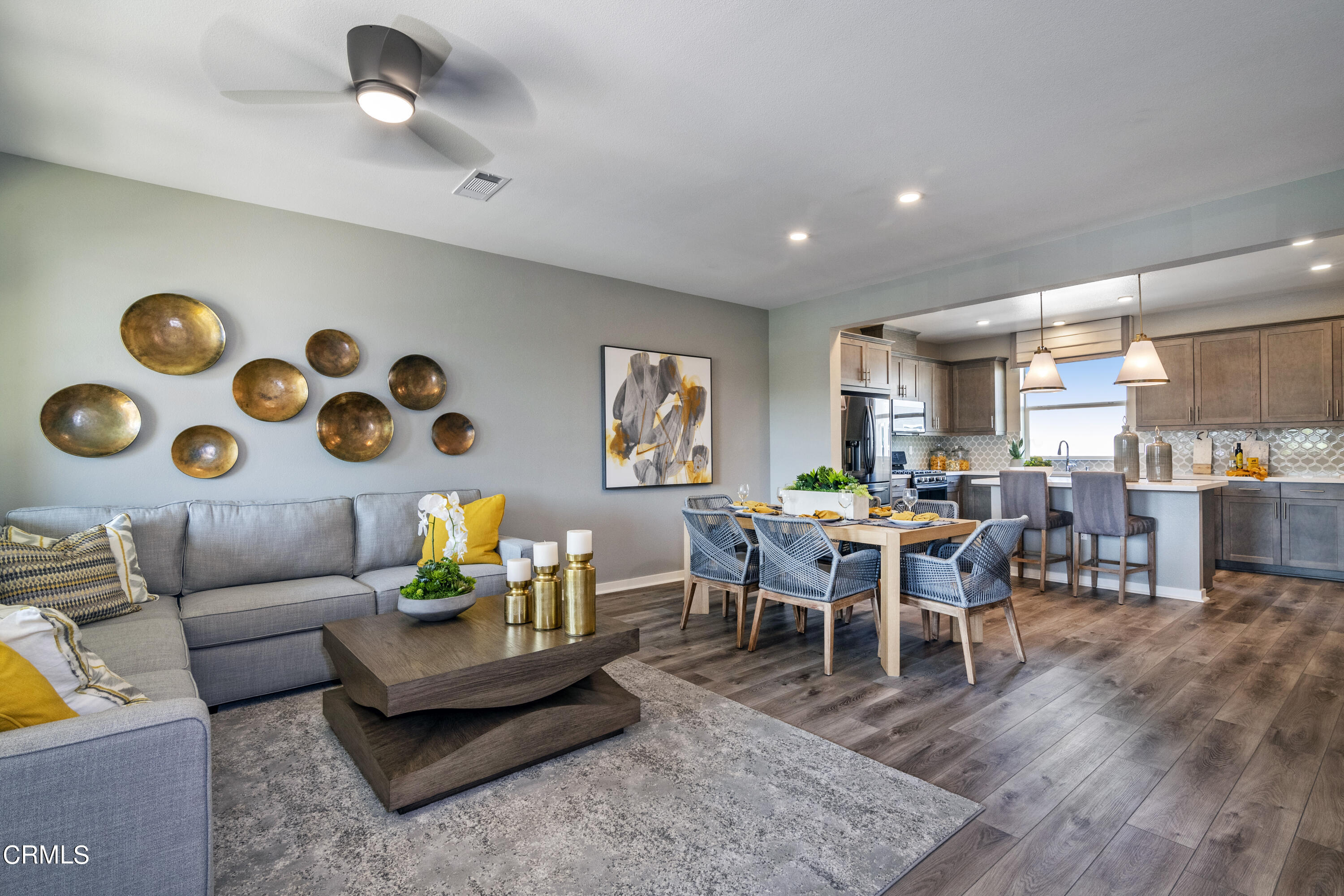 703 Winchester Drive Oxnard, CA 93036 - Photo 30 of 30 a living room with furniture and wooden floor
