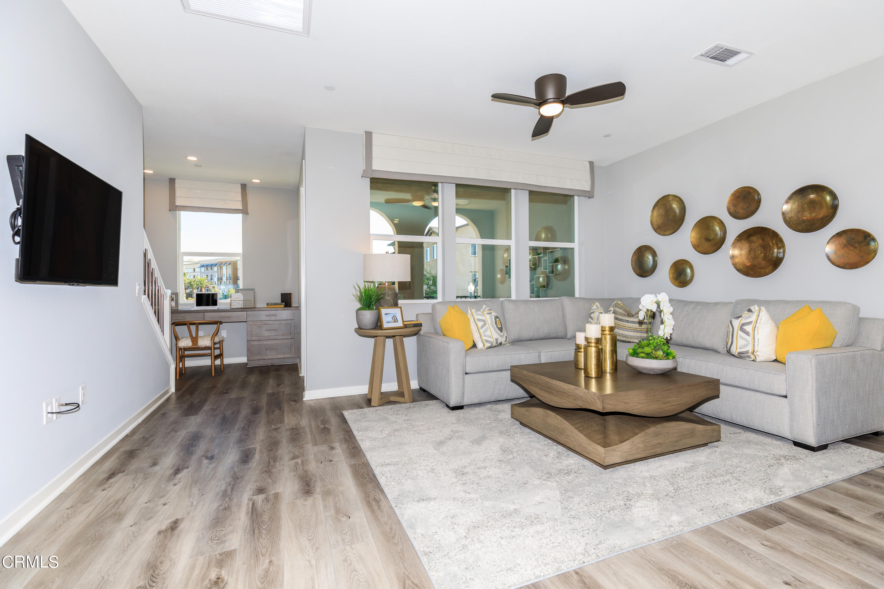 703 Winchester Drive Oxnard, CA 93036 - Photo 3 of 30 a living room with furniture and a flat screen tv