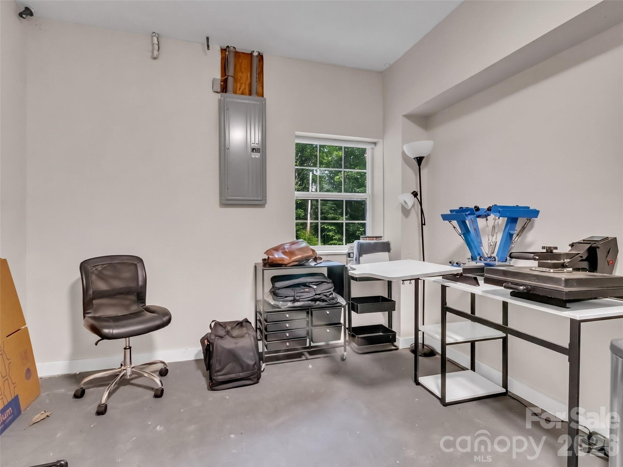 49 Brandywine Road Waynesville, NC 28786 - Photo 28 of 38 a view of a workspace with furniture and a window