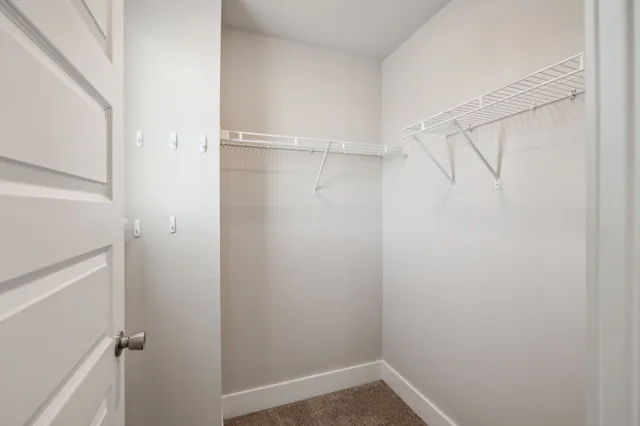 a view of an empty walk in closet