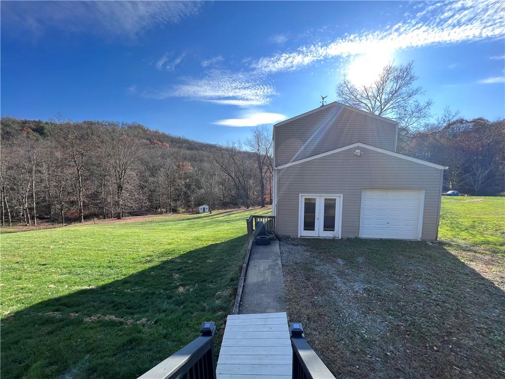 822 Old State Road Apollo, PA 15613 - Photo 2 of 28 a house view with a garden space