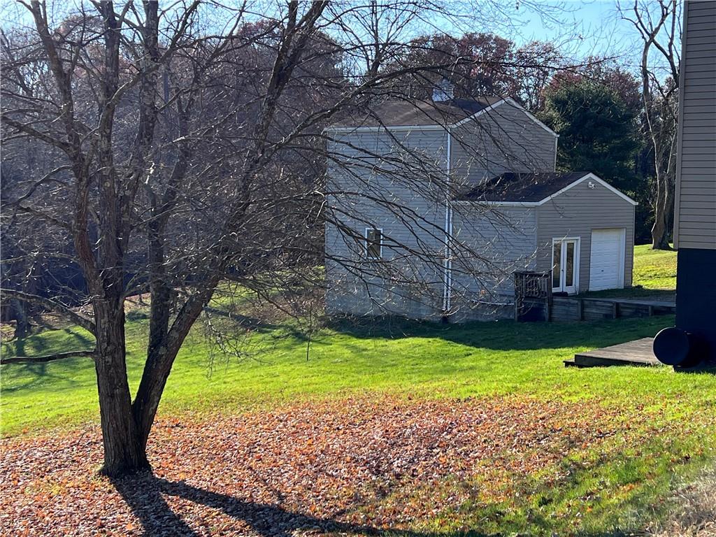 822 Old State Road Apollo, PA 15613 - Photo 28 of 28 a view of a house with a yard table and chairs