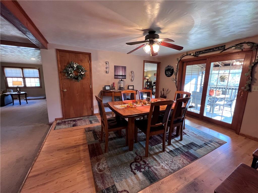 822 Old State Road Apollo, PA 15613 - Photo 8 of 28 a view of a dining room with furniture window and wooden floor