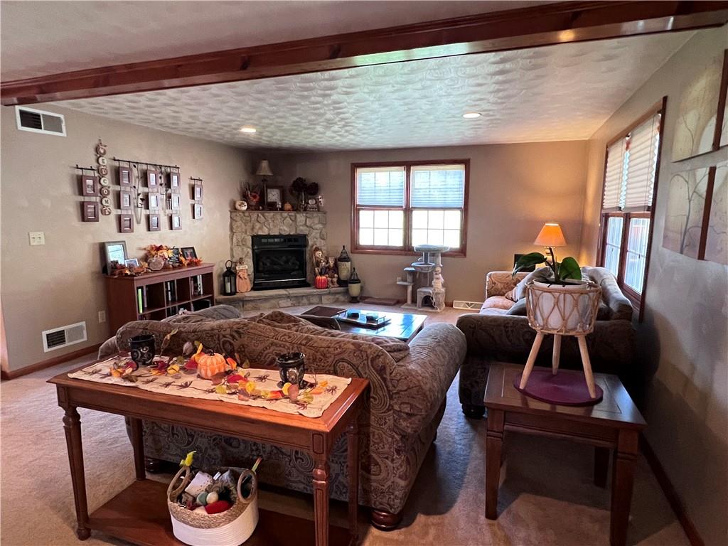 822 Old State Road Apollo, PA 15613 - Photo 10 of 28 a living room with furniture fireplace and window