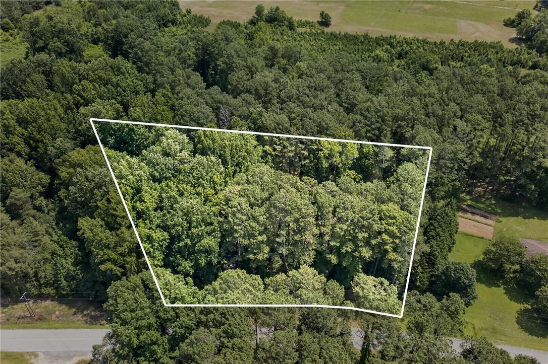 123 Robin Road Westminster, SC 29693 - Photo 47 of 50 Mature trees and ample green space define this generous wooded lot.