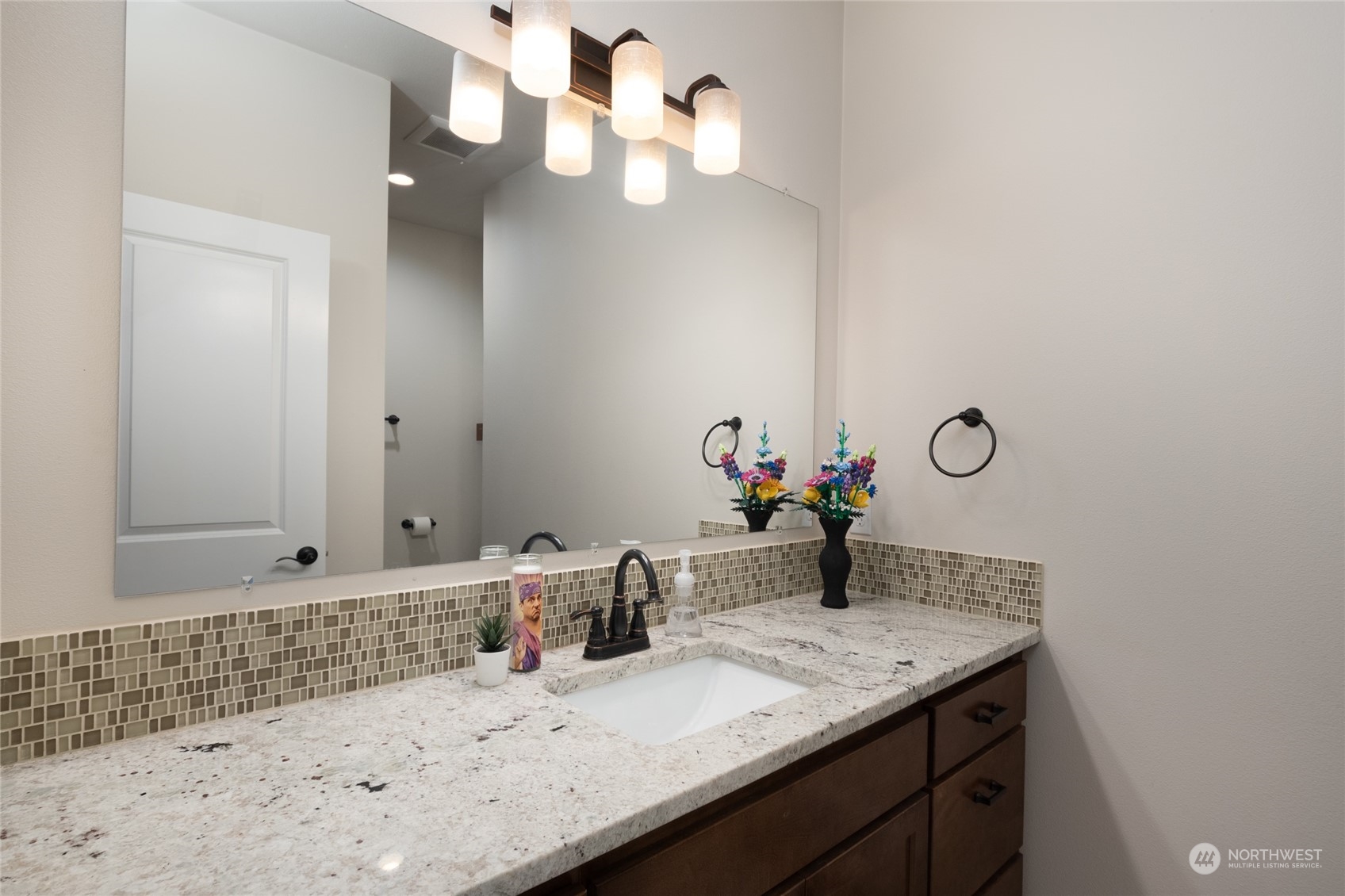 11 West Green Valley Road Oak Harbor, WA 98277 - Photo 18 of 36 a bathroom with a sink and a mirror
