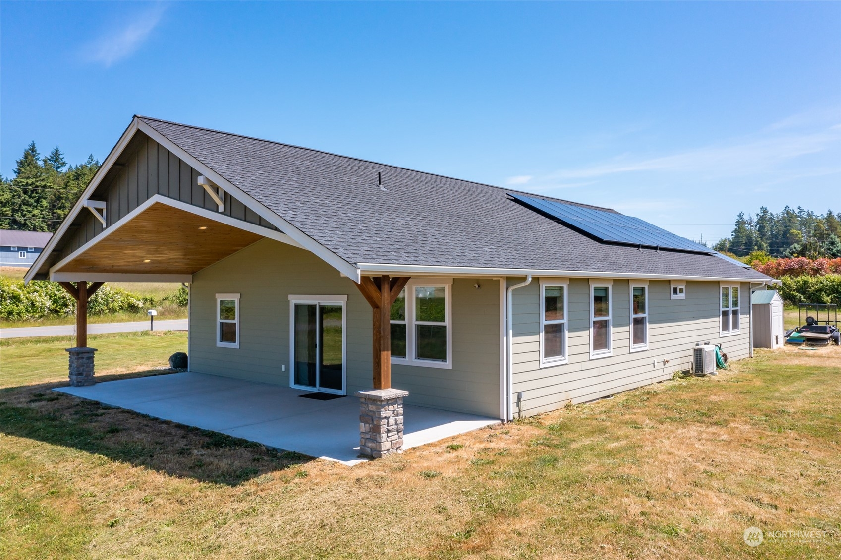 11 West Green Valley Road Oak Harbor, WA 98277 - Photo 24 of 36 a front view of a house with a yard outdoor seating and garage