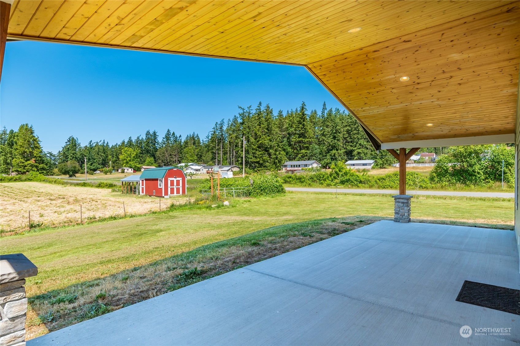 11 West Green Valley Road Oak Harbor, WA 98277 - Photo 27 of 36 a view of a fountain in front of a house with a big yard