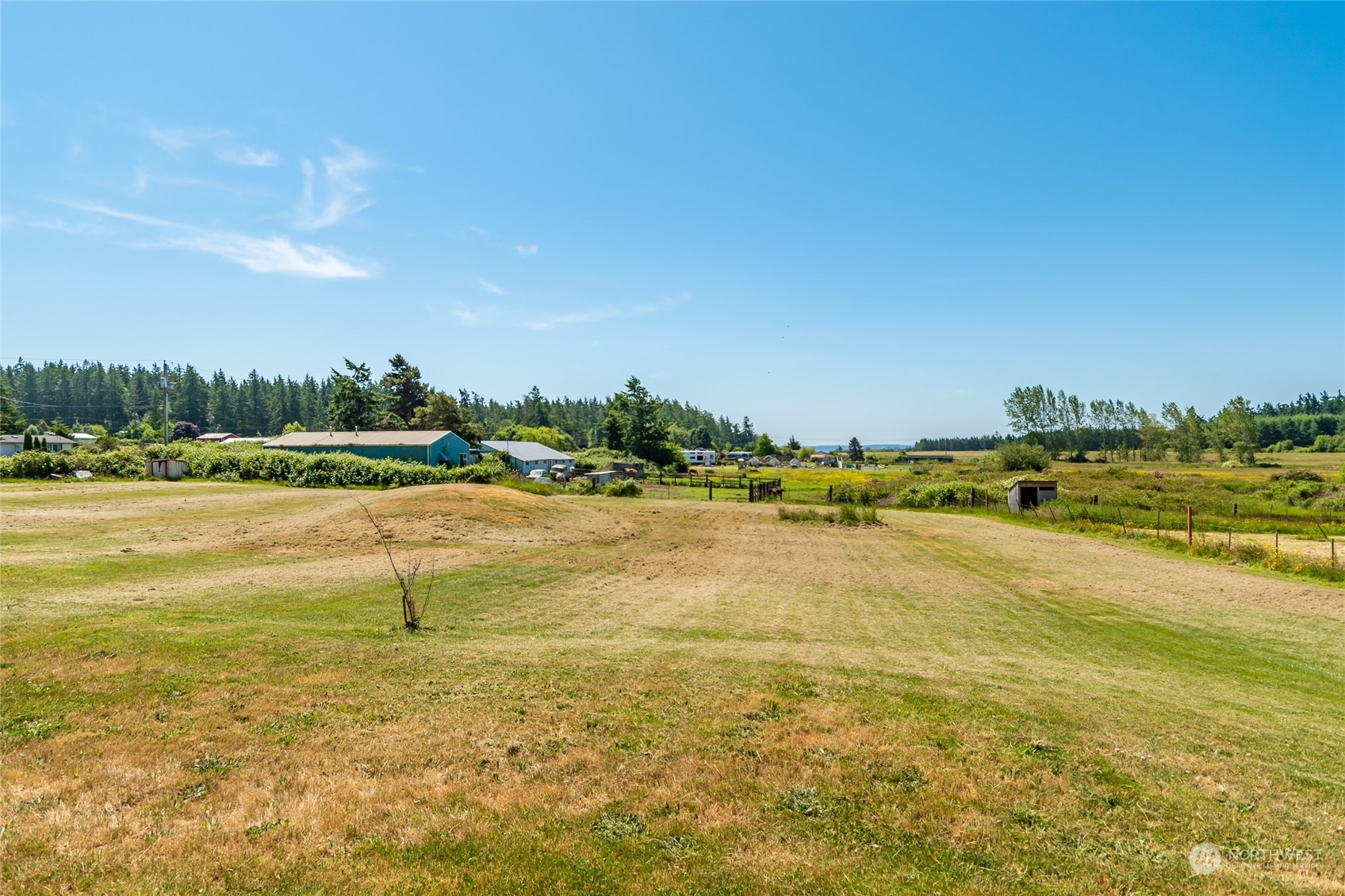 11 West Green Valley Road Oak Harbor, WA 98277 - Photo 33 of 36 a view of a lake with a nearby beach
