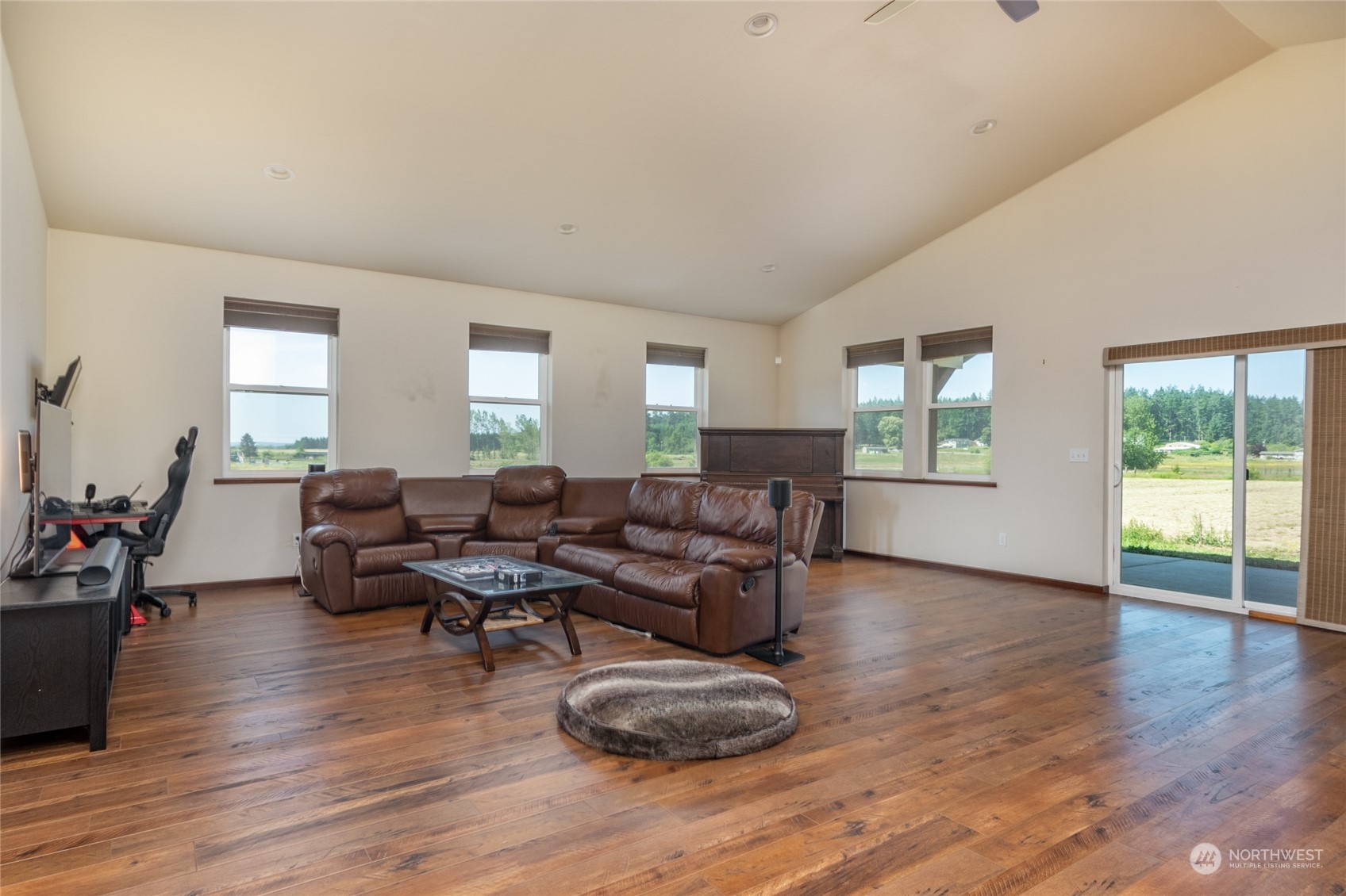 11 West Green Valley Road Oak Harbor, WA 98277 - Photo 9 of 36 a living room with furniture window and wooden floor