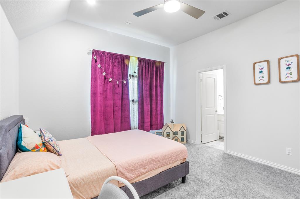 464 Renaissance Lane Irving, TX 75060 - Photo 25 of 31 a bed room with a bed and a chair