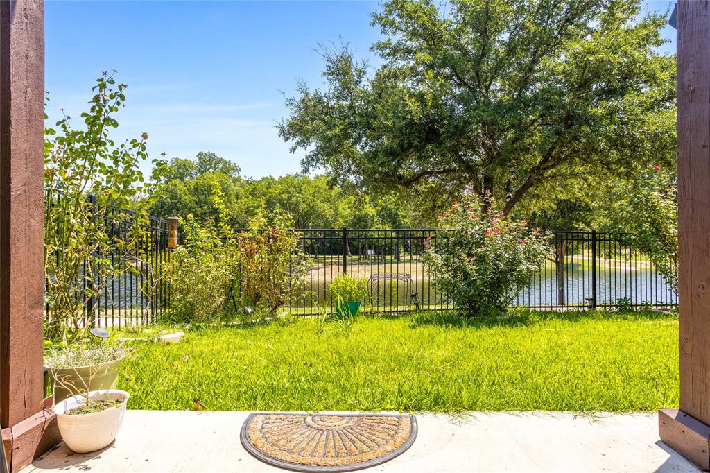 464 Renaissance Lane Irving, TX 75060 - Photo 30 of 31 a view of swimming pool with a garden