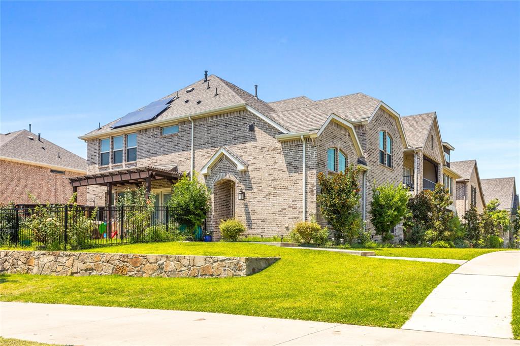 464 Renaissance Lane Irving, TX 75060 - Photo 3 of 31 a front view of a house with swimming pool