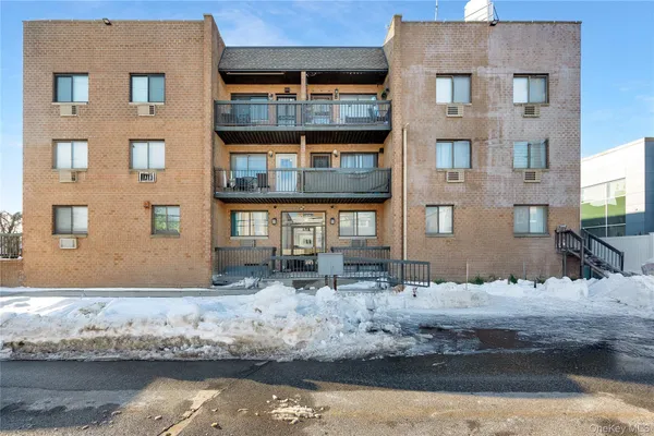 a view of a brick house with a window