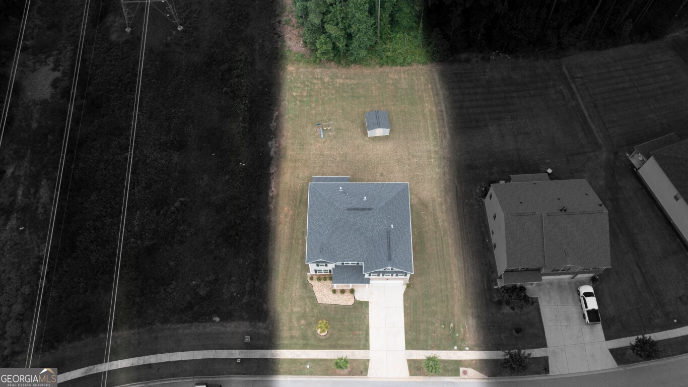 8084 Louis Drive Locust Grove, GA 30248 - Photo 3 of 44 an aerial view of residential house with stairs