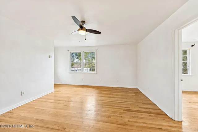 a view of an empty room and window
