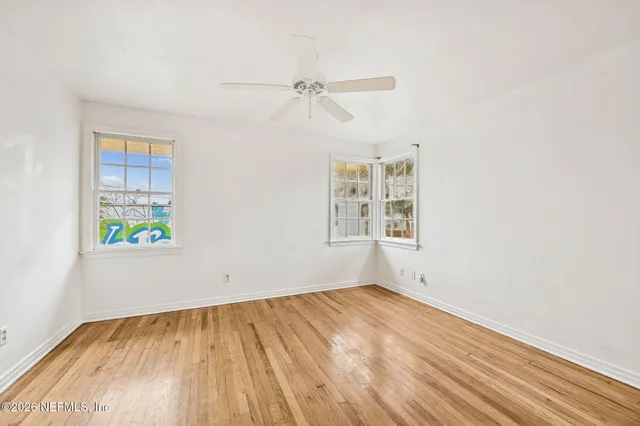 an empty room with windows