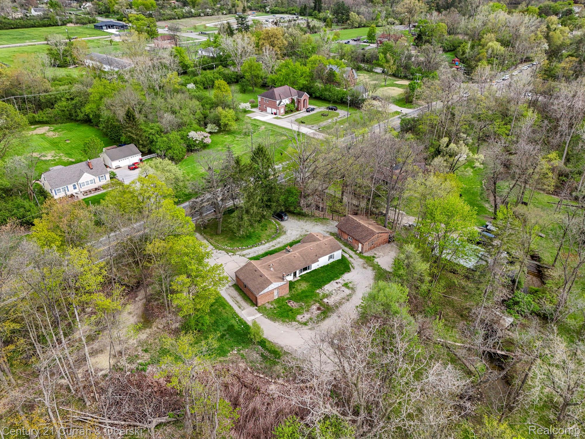 25205 Inkster Road Farmington, MI 48336 - Photo 2 of 46 Aerial perspective of suburban area