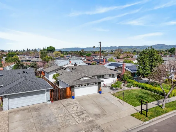 a house view with a garden space
