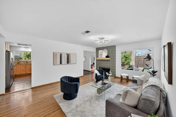a living room with furniture or couch and a window