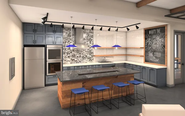 a kitchen with granite countertop a refrigerator and a sink