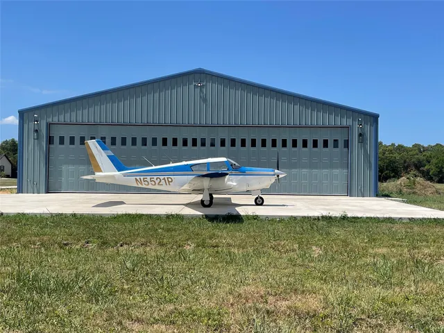 a view of a house with a swimming pool