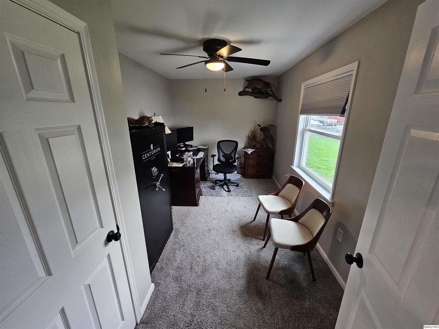 306 Walker Street Ursa, IL 62376 - Photo 20 of 20 a view of a livingroom with furniture and a window