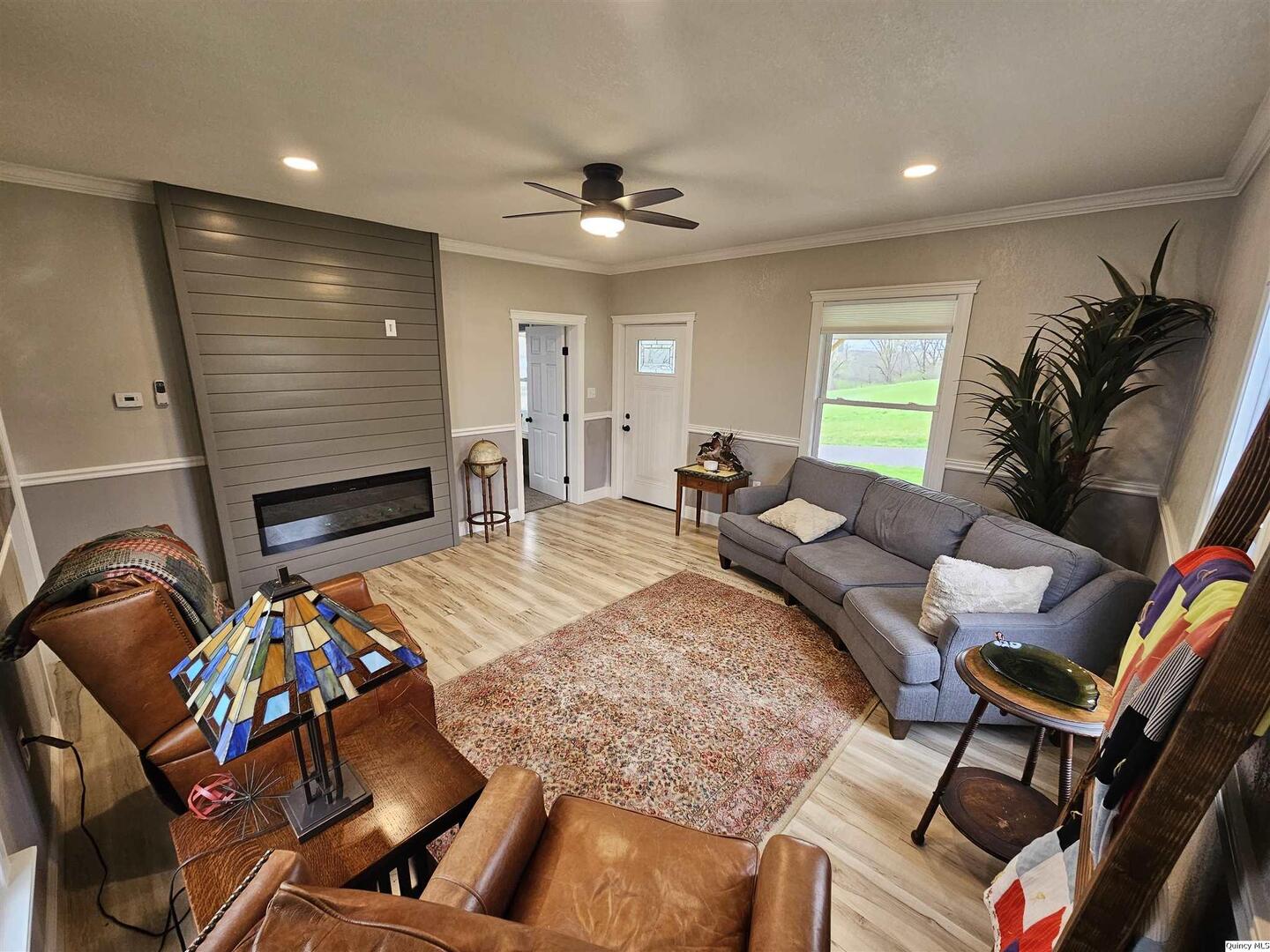 306 Walker Street Ursa, IL 62376 - Photo 7 of 20 a living room with furniture