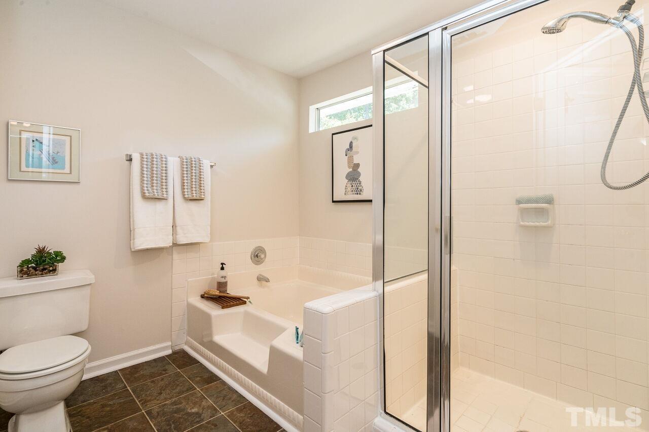 2 Halsey Place Durham, NC 27707 - Photo 20 of 27 a bathroom with a shower and a toilet