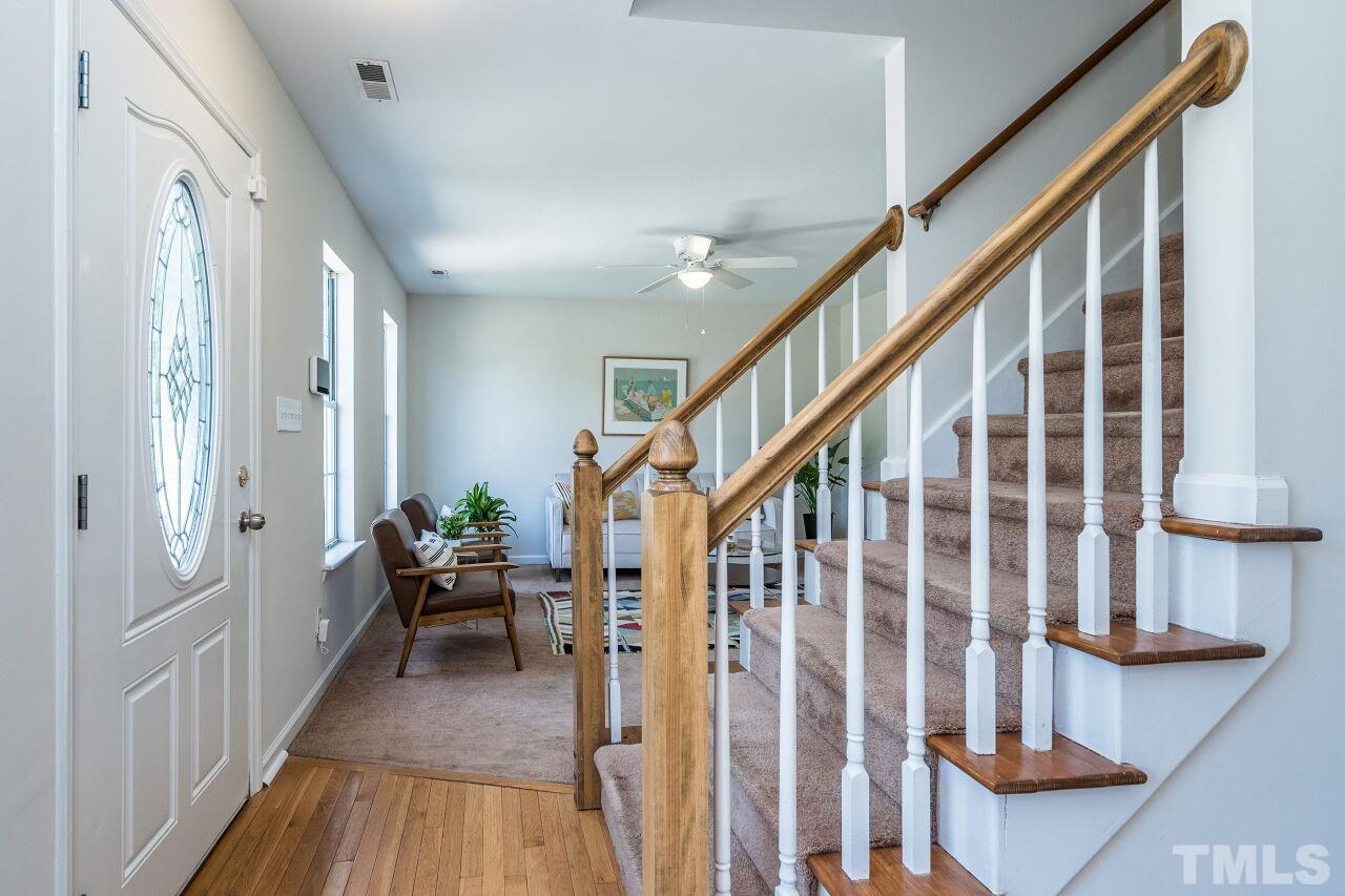 2 Halsey Place Durham, NC 27707 - Photo 3 of 27 a view of entryway with wooden floor and stairs