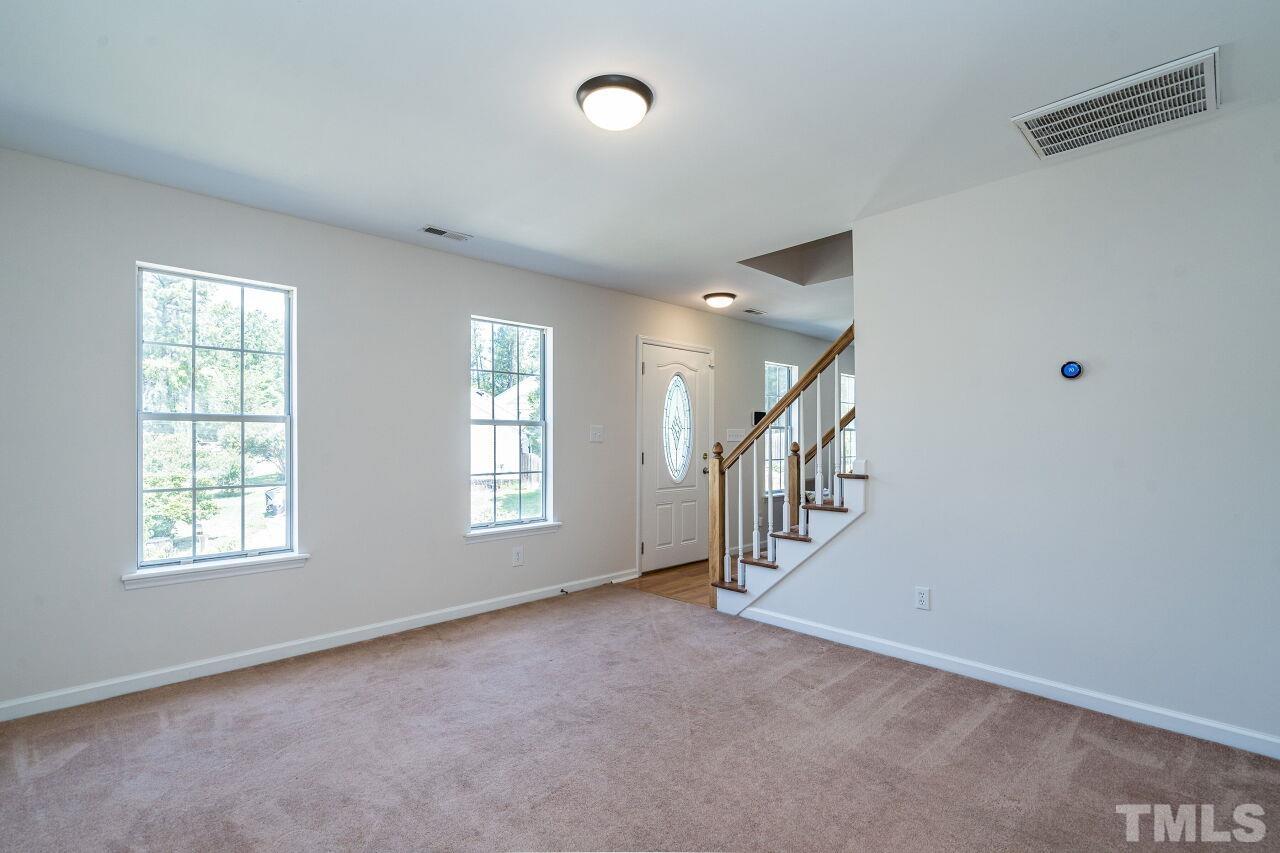 2 Halsey Place Durham, NC 27707 - Photo 6 of 27 a view of an empty room with a window