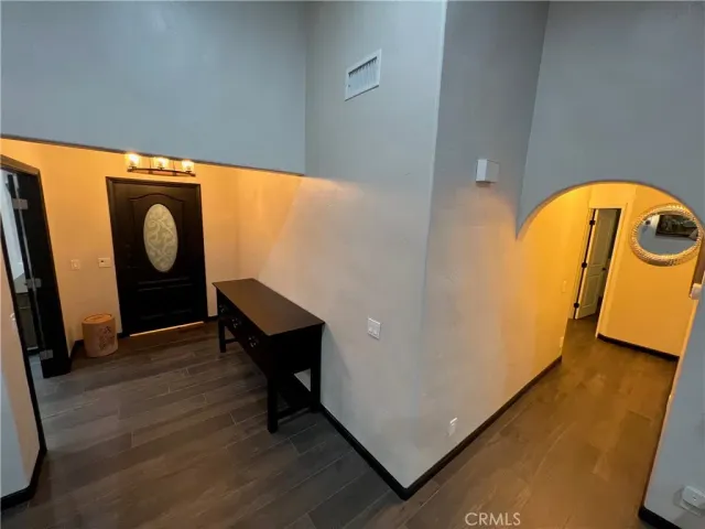 a view of a chairs and table in the patio