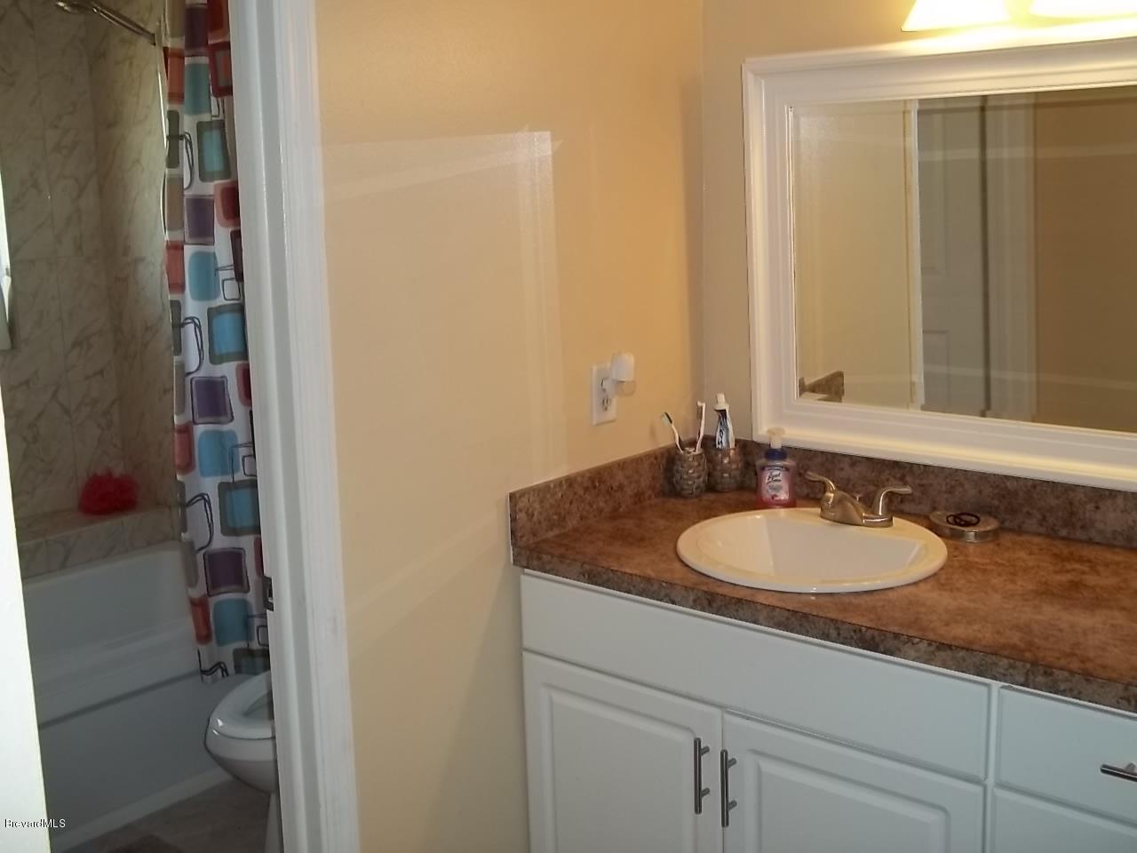 1140 Gary Hunt Road, Unit A Cocoa, FL 32926 - Photo 21 of 35 upstairs