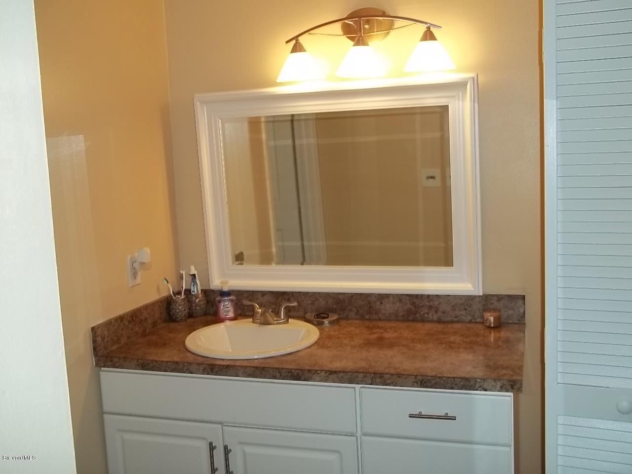 1140 Gary Hunt Road, Unit A Cocoa, FL 32926 - Photo 28 of 35 upstairs sink