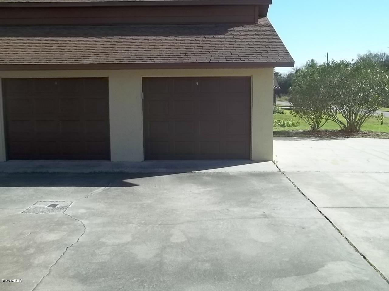 1140 Gary Hunt Road, Unit A Cocoa, FL 32926 - Photo 31 of 35 detached garage and assigned space