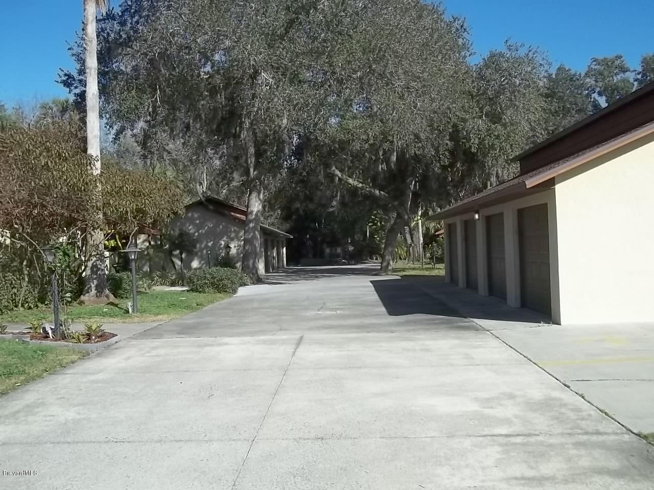 1140 Gary Hunt Road, Unit A Cocoa, FL 32926 - Photo 33 of 35 road on side of house