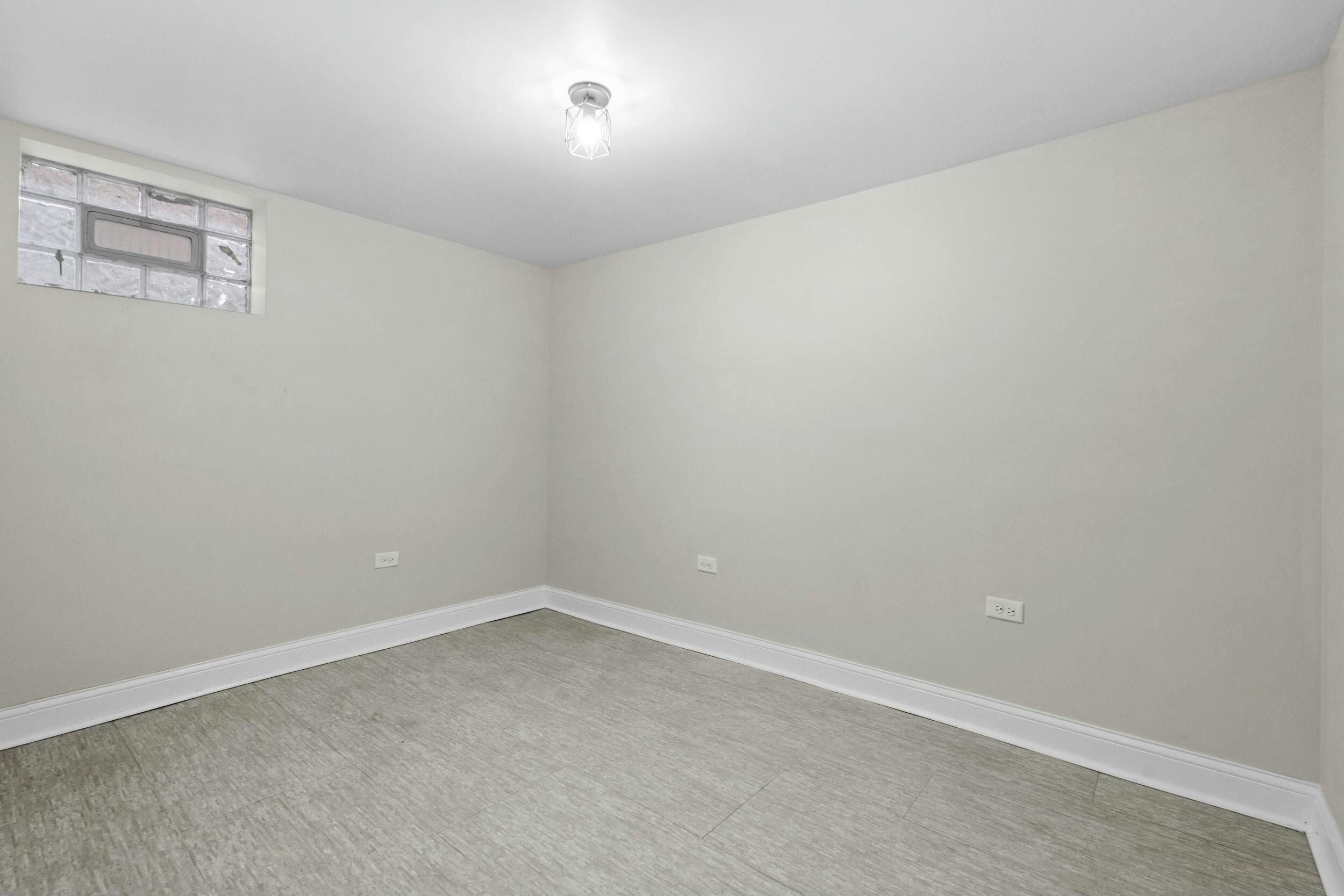 800 Garfield Street Gary, IN 46404 - Photo 22 of 23 wooden floor in an empty room