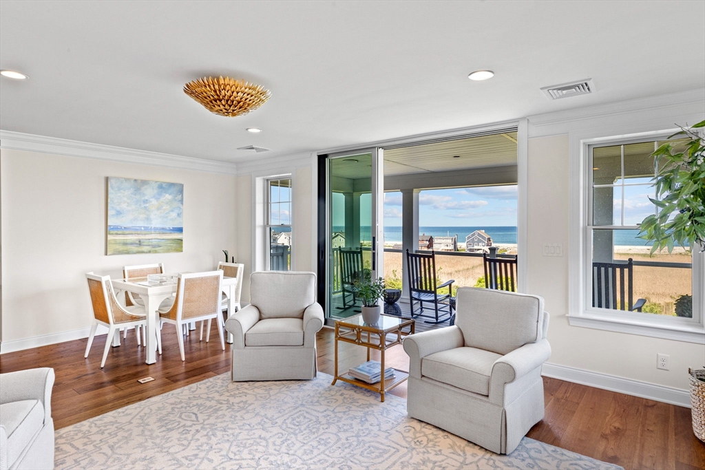 148 Hatherly Road, Unit 148 Scituate, MA 02066 - Photo 23 of 42 a living room with furniture and a large window